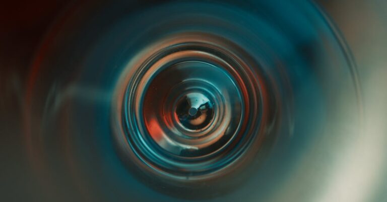 A mystical abstract image featuring a vortex with vivid blue and orange lighting, creating a futuristic and cinematic feel.